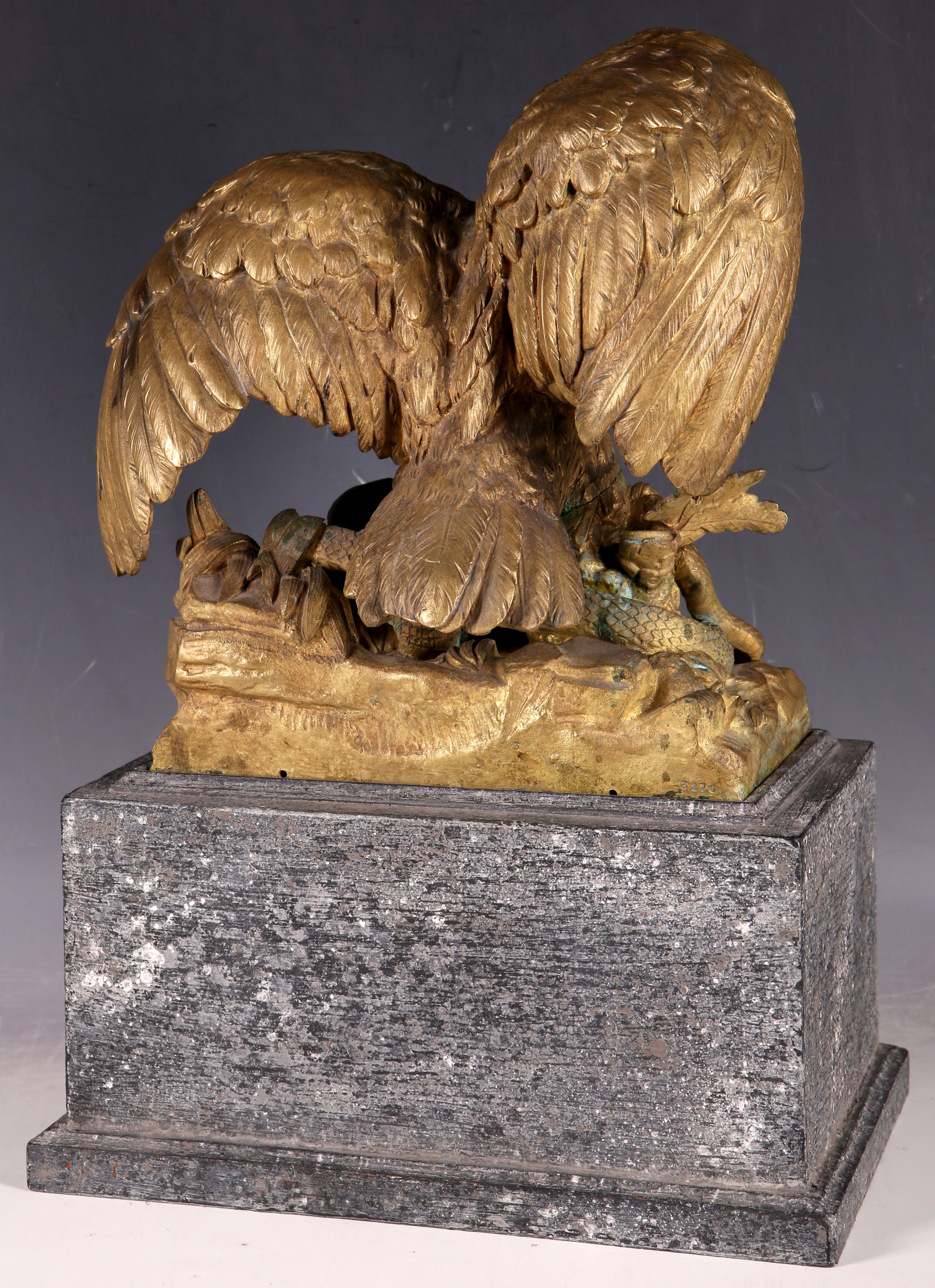 A dramatic 19th Century gilt bronze group of an eagle and serpent, the base stamped 3276, size - Image 2 of 2
