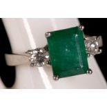 An 18ct white gold emerald and diamond ring, 2.40ct emerald and 0.4ct diamond.