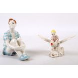 Two Soviet porcelain figurines; a seating boy and a boy on a goose, largest 13cm H, maker: Dmitrov