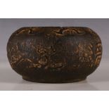 A Chinese stone bowl, relief carving of bats above dragon, phoenix and inscriptions, character stamp