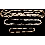 Three cultured pearl necklaces, sold together with a stick pin. (4)