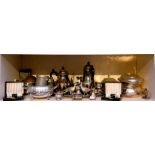 A quantity of silver plate items, to include a four piece tea set, various condiments, a muffin