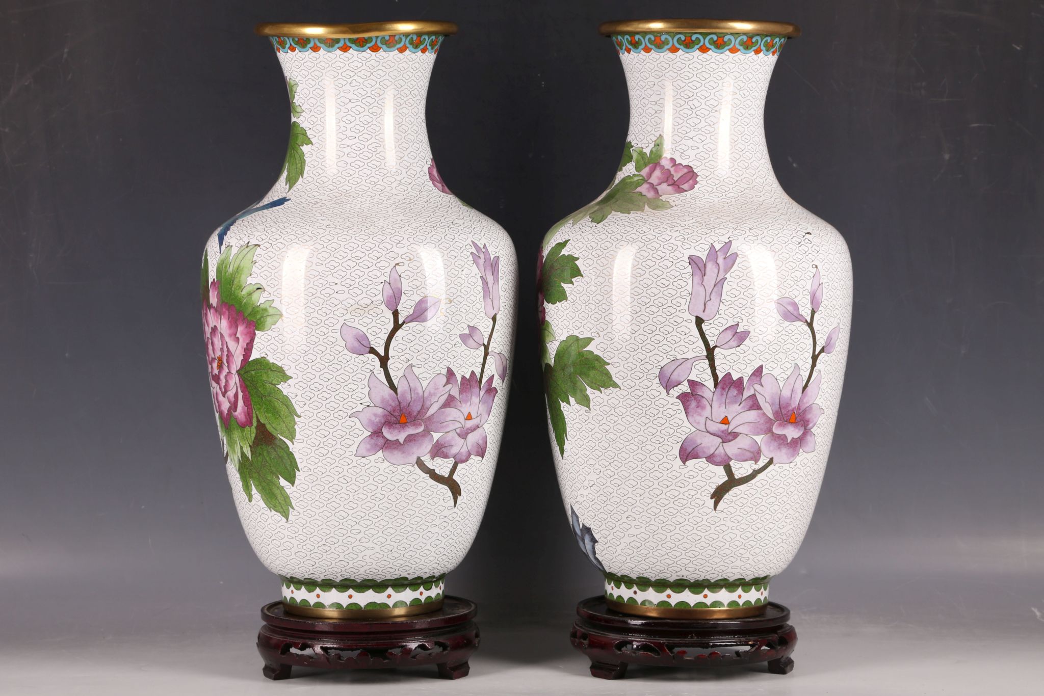 A pair of large cloisonné vases, with birds among flower blossoms on white ground, on wooden stand. - Image 3 of 4