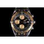 A Breitling Super Avenger chronograph wristwatch, in stainless steel and 18ct gold, with black and