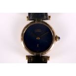 A ladies Must de Cartier VLC watch, in silver gilt with lapis blued dial, quartz movement and