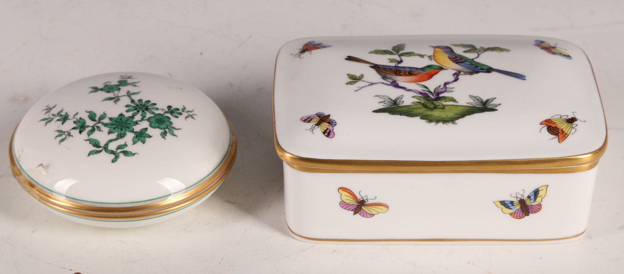 A Herend porcelain rectangular box and cover, hand-painted with birds and butterflies, and a