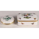 A Herend porcelain rectangular box and cover, hand-painted with birds and butterflies, and a