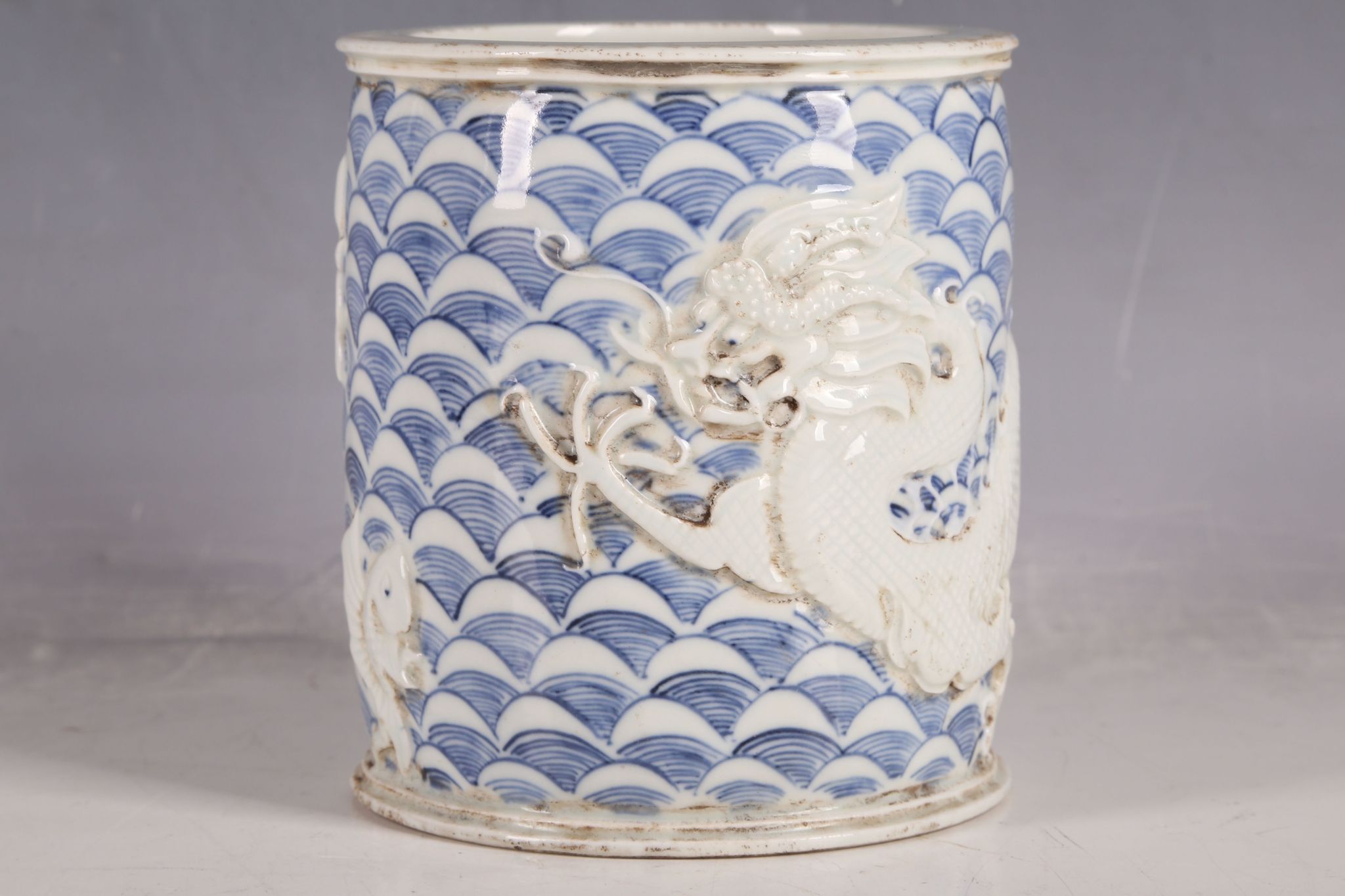 A Chinese brush pot, blue wave decoration with applied five toe, open mouth dragon, chasing - Image 3 of 4