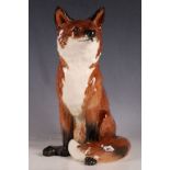 A Beswick fireside fox, impress 2348, 31cm H.