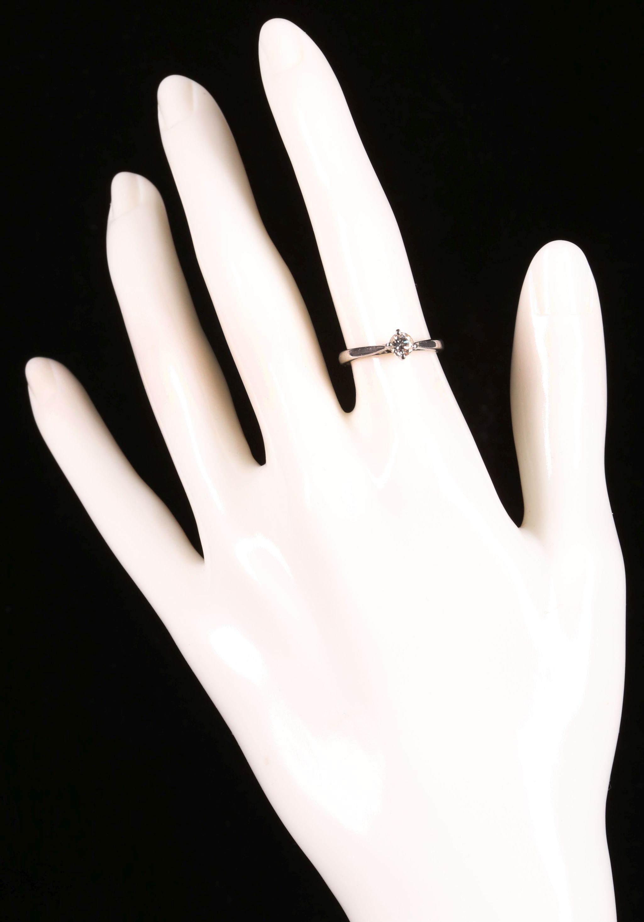 A platinum and diamond solitaire ring. - Image 3 of 3