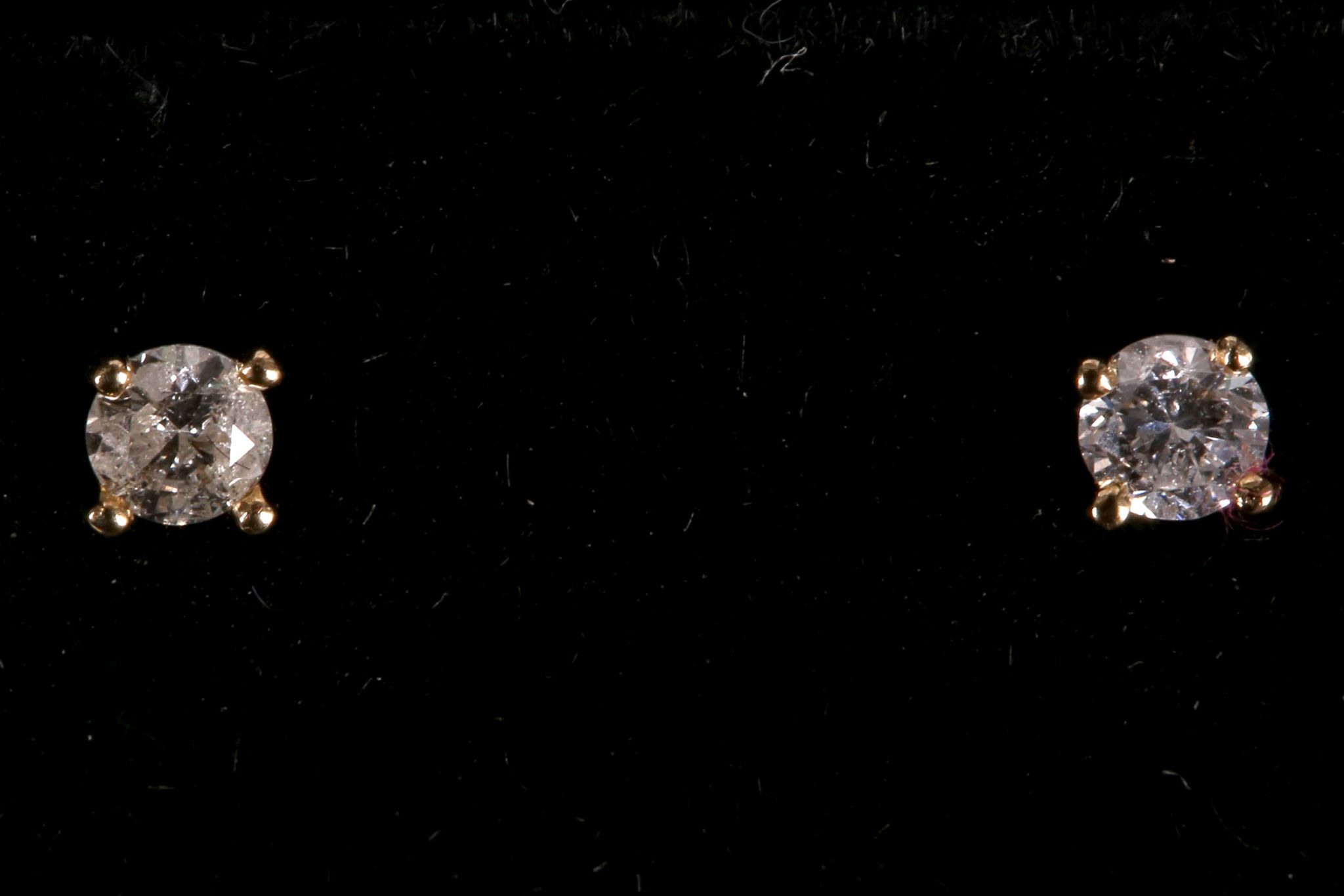 A pair of 18ct yellow gold and diamond studs (dia. 0.29ct total).