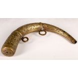 An 18th/19th Century Dutch brass powder horn, floral decoration with traces of wax/enamelling, two