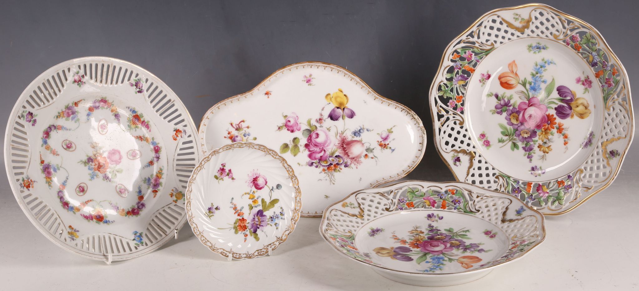 A various selection of late 19th or early 20th Century Dresden porcelain cabinet plates, all painted
