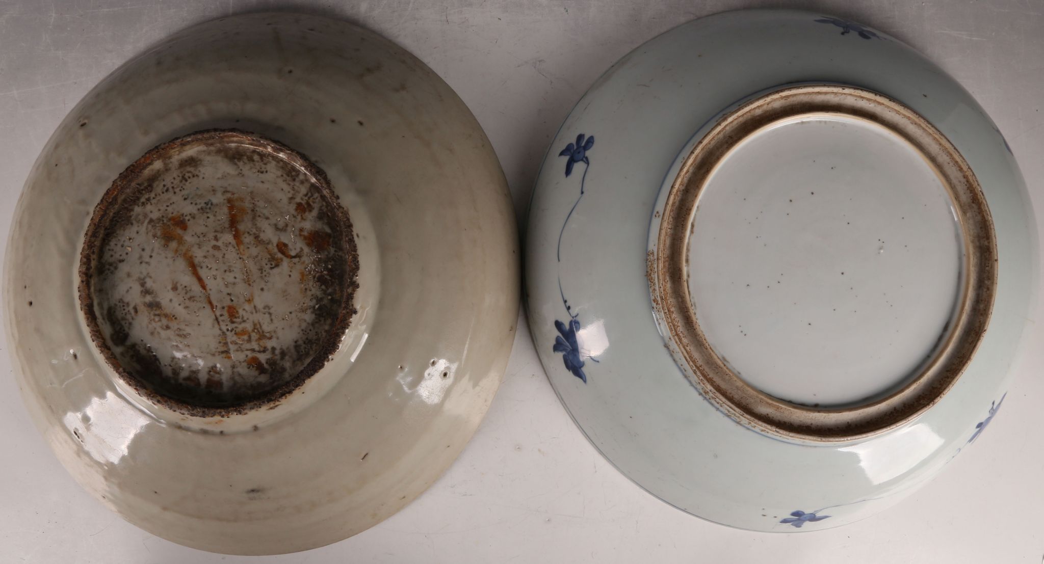 A Chinese large blue and white dish, decorated with a phoenix, together with another blue and - Image 2 of 2