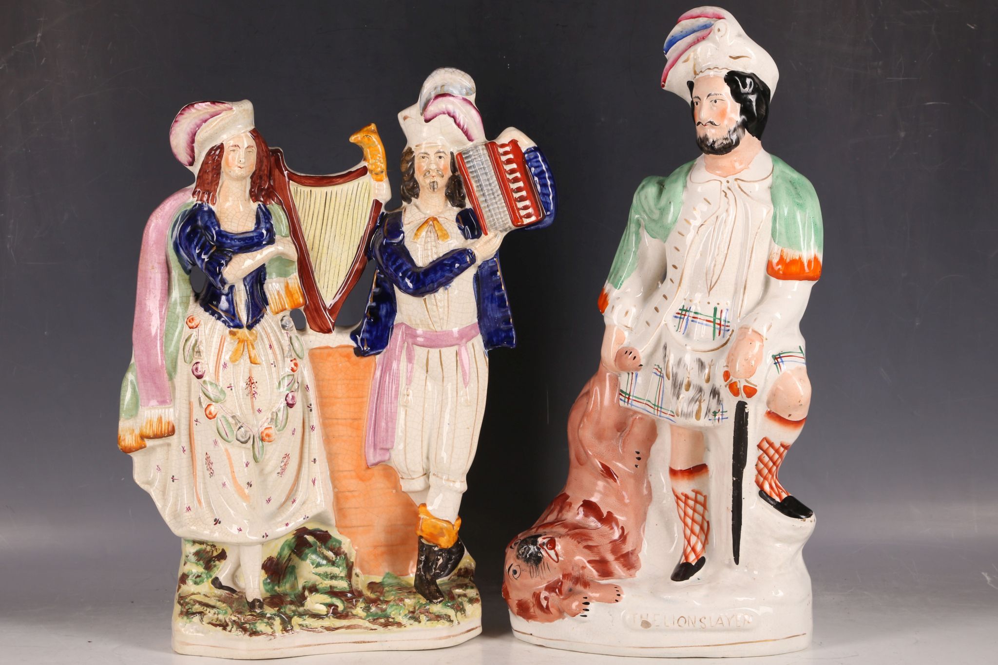 Two 19th Century glazed Staffordshire pottery figures, one entitled 'Prodigals Return', the other of
