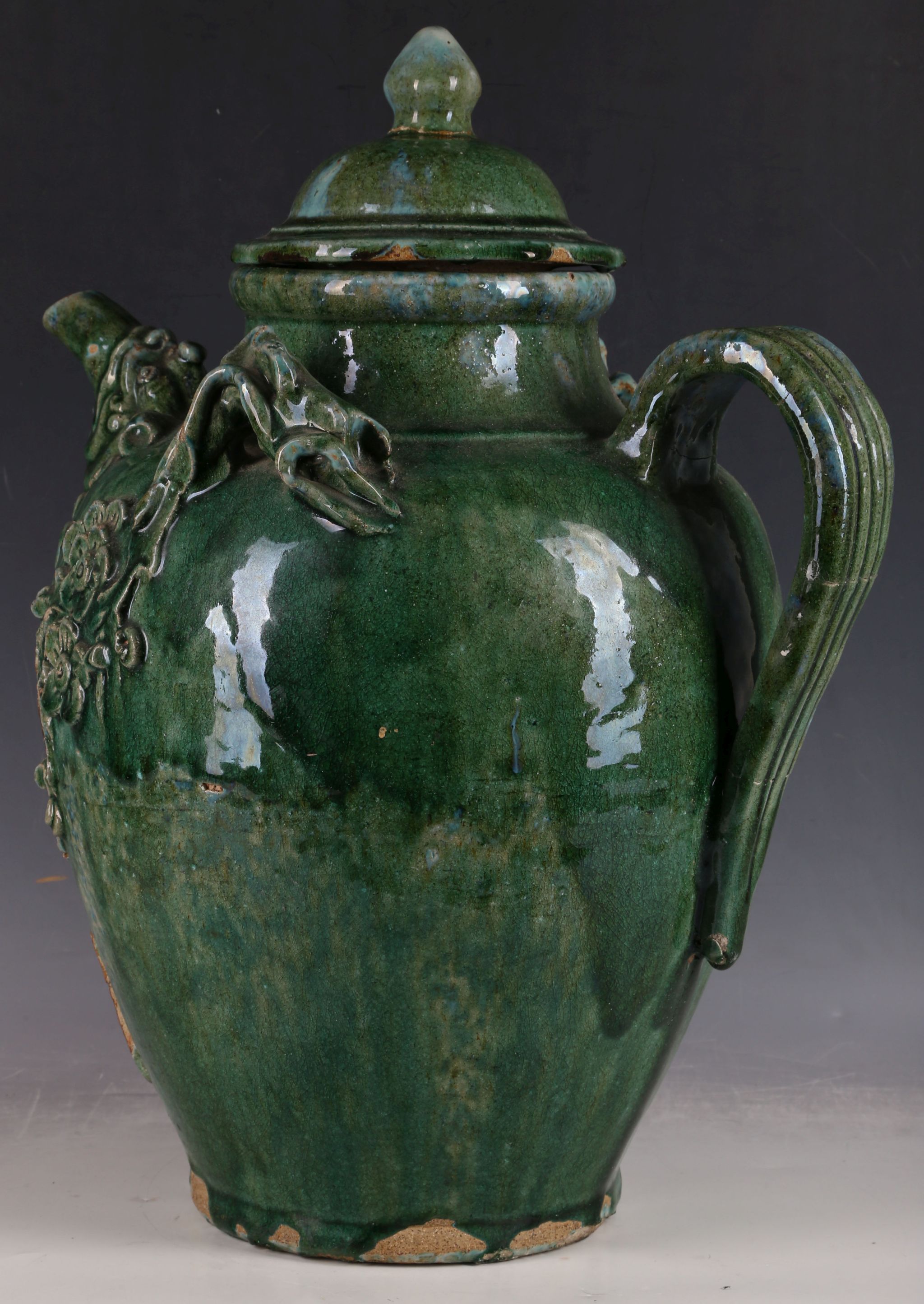 A large Chinese green glazed wine jug and cover, with peony modelled decoration, a mythical beast - Image 2 of 4