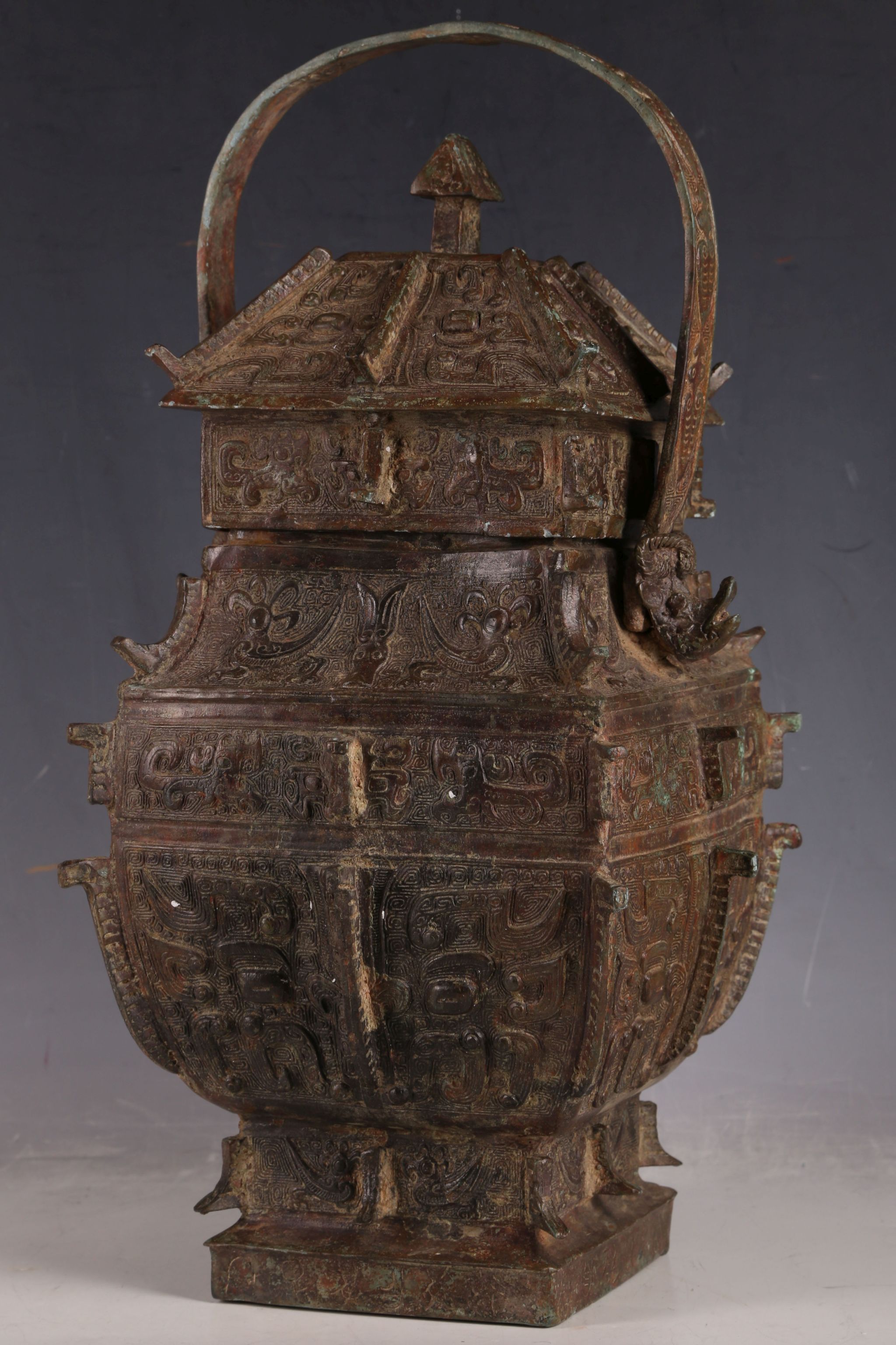 A Chinese archaic form bronze jar of temple design, scrolls and temple dogs to lid, insects to - Image 4 of 5