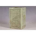 A Chinese celadon box form vase, inscriptions in relief to all panels, character marks to base, 12.