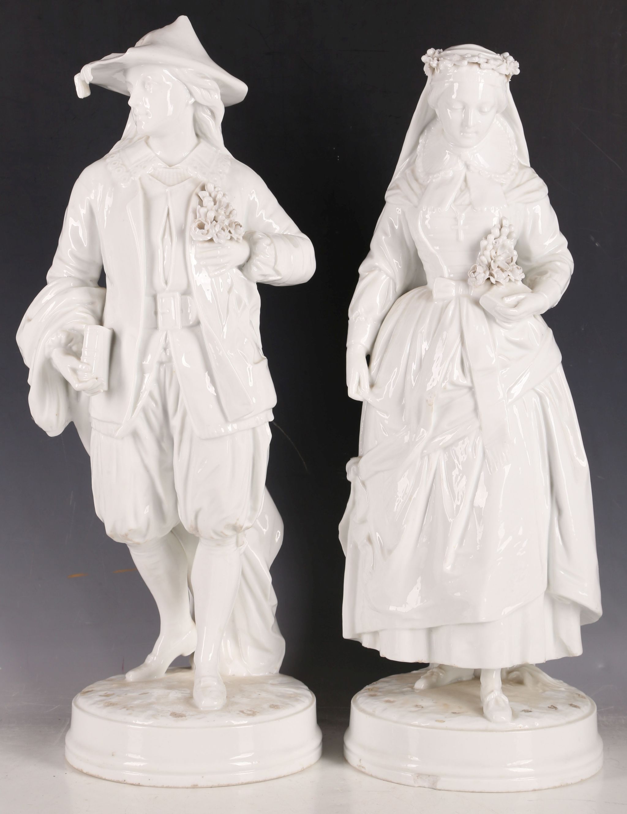 19th Century Thuringia figures; study of 18th Century young man with flowers and  young lady bearing