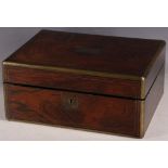 A 19th Century brass bound rosewood box, with rising hinged top opening to reveal jewellery