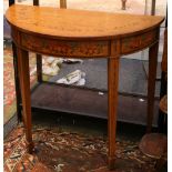 A Sheraton Revival demi-lune satinwood table, with painted decoration, supported on square tapered