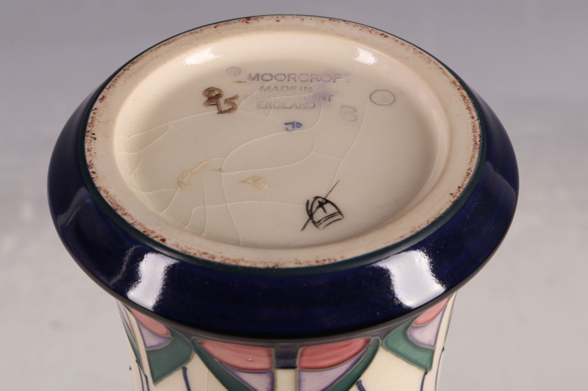 A Moorcroft tube-line vase, everted rim, Mackintosh rose pattern, marks for Ann Bishop, 25.9cm H. - Image 6 of 6