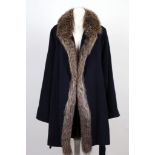 A vintage Yves St Laurent, Paris, dark blue cashmere and angora three quarter ladies jacket, with