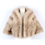 A good vintage, light beige mink bolero jacket, with collar, short sleeves, side pockets, satin