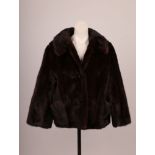 A fine dark brown mink short jacket by Sidney Katz, London, W.I., with collar, patch pocket