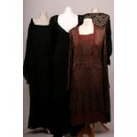 Five 1920s lace cocktail dresses, including dropped waists, detailed sleeves, diamanté beading, four