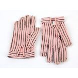 A pair of 1954 Hermés pale pink and grey stripe fabric hand stitched gloves, with stitch detail (
