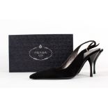 A classic pair of Prada black suede 50s style sling backs, with pointed toe, high stiletto heel,