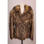 A vintage brown wolf fur jacket, with large film star collar, side pockets, (with black protector