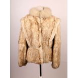 A 1960s Split Ends Ltd rabbit fur ladies jacket with white fox collar, V-shape design with big