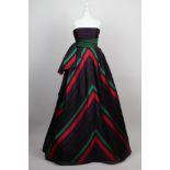 A 1970s André Laug runway model ball gown, strapless with bustle layers in coordinated greens,
