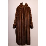 A fine 1940s, light brown full length Mink coat, with film star collar, with bracelet sleeves with