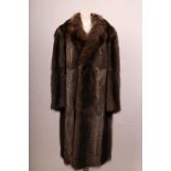 A good vintage wolf gentleman's full length fur coat, with collar, long sleeves, side pockets,