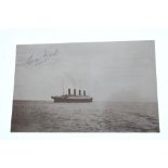 TITANIC - A modern monochrome postcard (89 x 140mm) of RMS Titanic signed in blue ink in the top