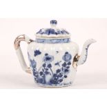 A Chinese blue and white ribbed teapot and cover. Qing Dynasty, Kangxi period. Painted with