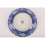 A Chinese blue and white ogee bowl. Late Qing, 19th Century. The exterior vividly painted with a