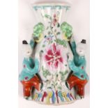 A Chinese porcelain wall vase. Qing Dynasty, 19th Century. Brightly painted in enamels with a