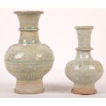 Two Chinese qingbai bottle vases. Song / Yuan Dynasty (960-1368). Each with a globular body,