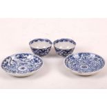 Two Chinese blue and white miniature tea cups and saucers. Qing, 18th /19th Century. Decorated