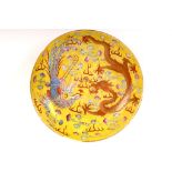 A Chinese dragon and phoenix dish. Qing Dynasty, Guangxu mark and possibly of the period. Boldly