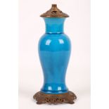 A Chinese monochrome crackled turquoise glazed vase. 18th Century. Mounted as a lamp with European