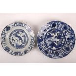 Two blue and white Kraak ware plates. China, Qing Dynasty. One decorated with a phoenix, the other