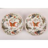 A pair of Chinese lobed foliate rimmed butterfly dishes. Qianlong mark but later. Each with five