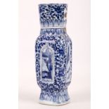 A Chinese blue and white vase. Qing Dynasty, 18th Century. Of rectangular section with canted edges,