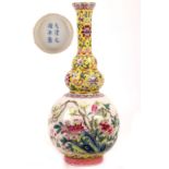 A famille rose triple gourd vase. Qing Dynasty, Guangxu mark and of the period. The lower bulb