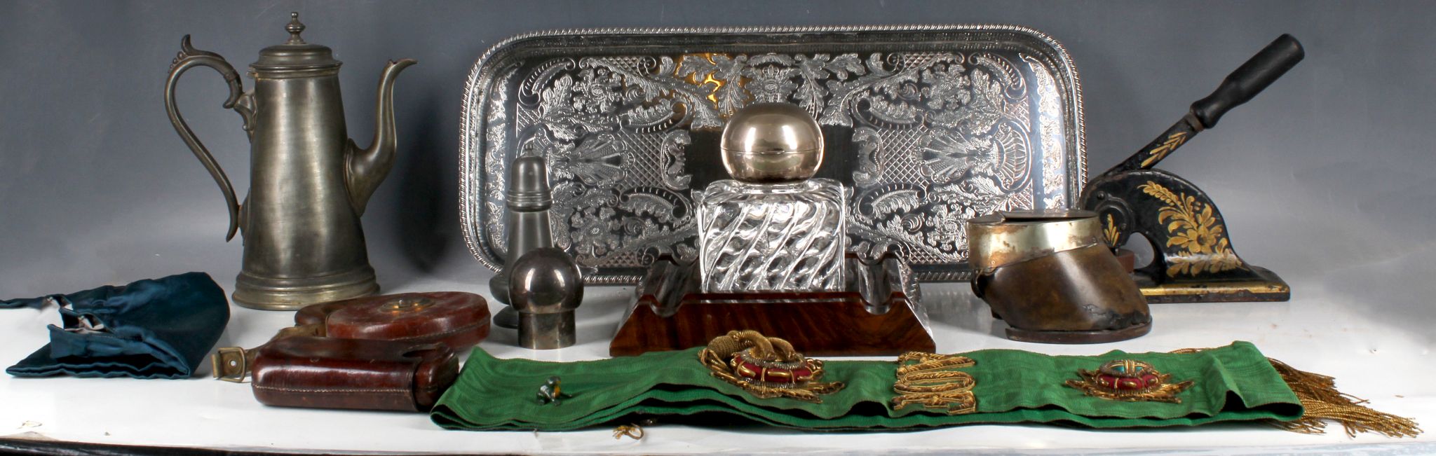 A horse's hoof inkwell, crystal cube inkwell, pewter teapot, leather tape and other items.